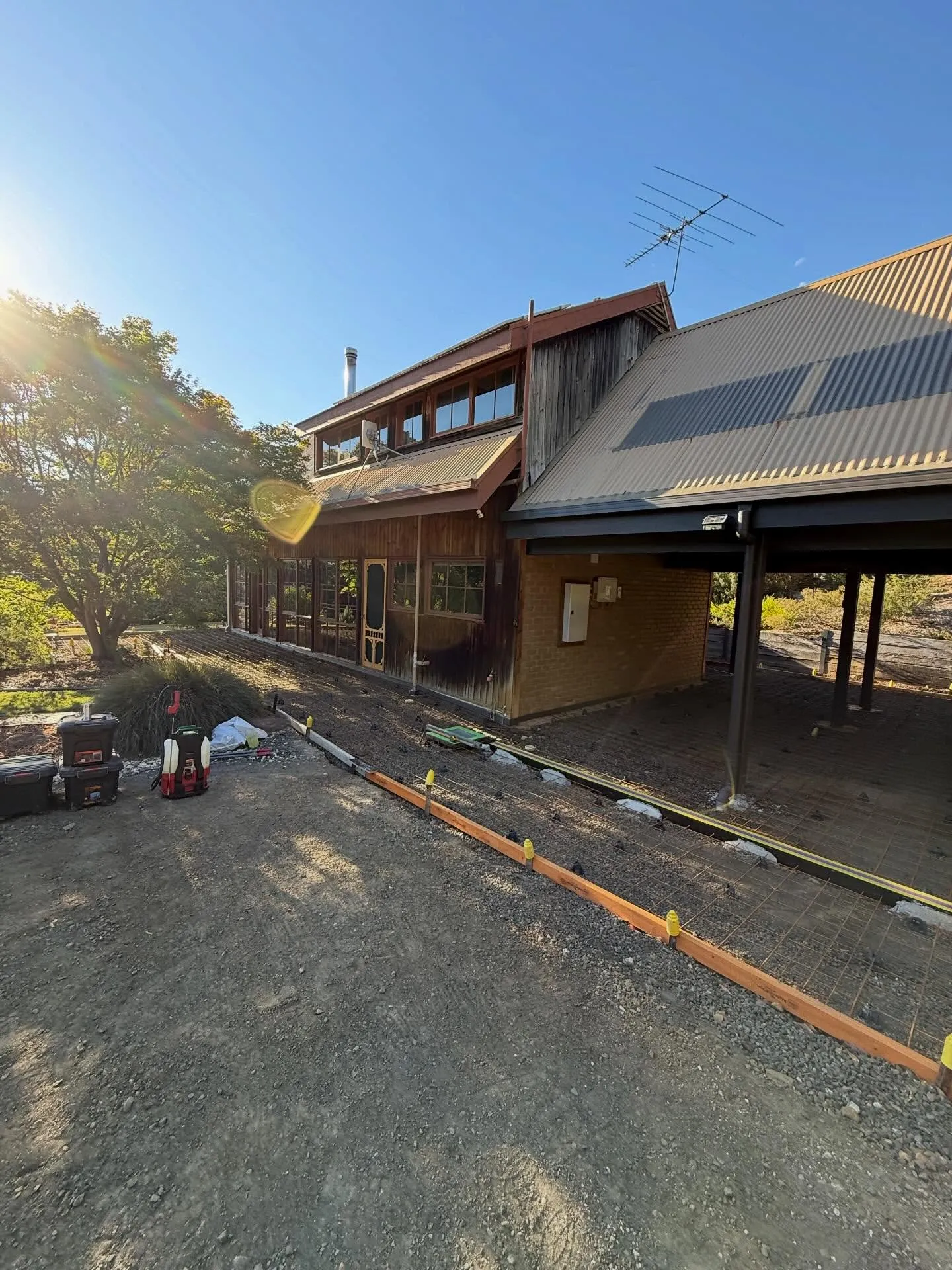 Formwork running along the verandah at a mud-brick and timber rural home
